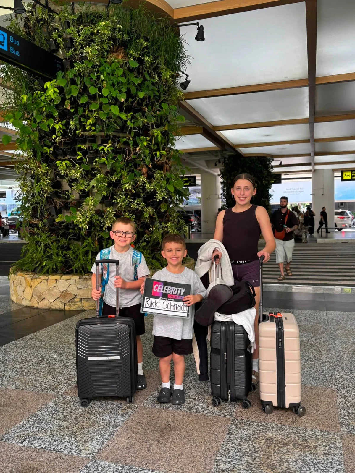 Guests picked up at the airport with a welcome sign