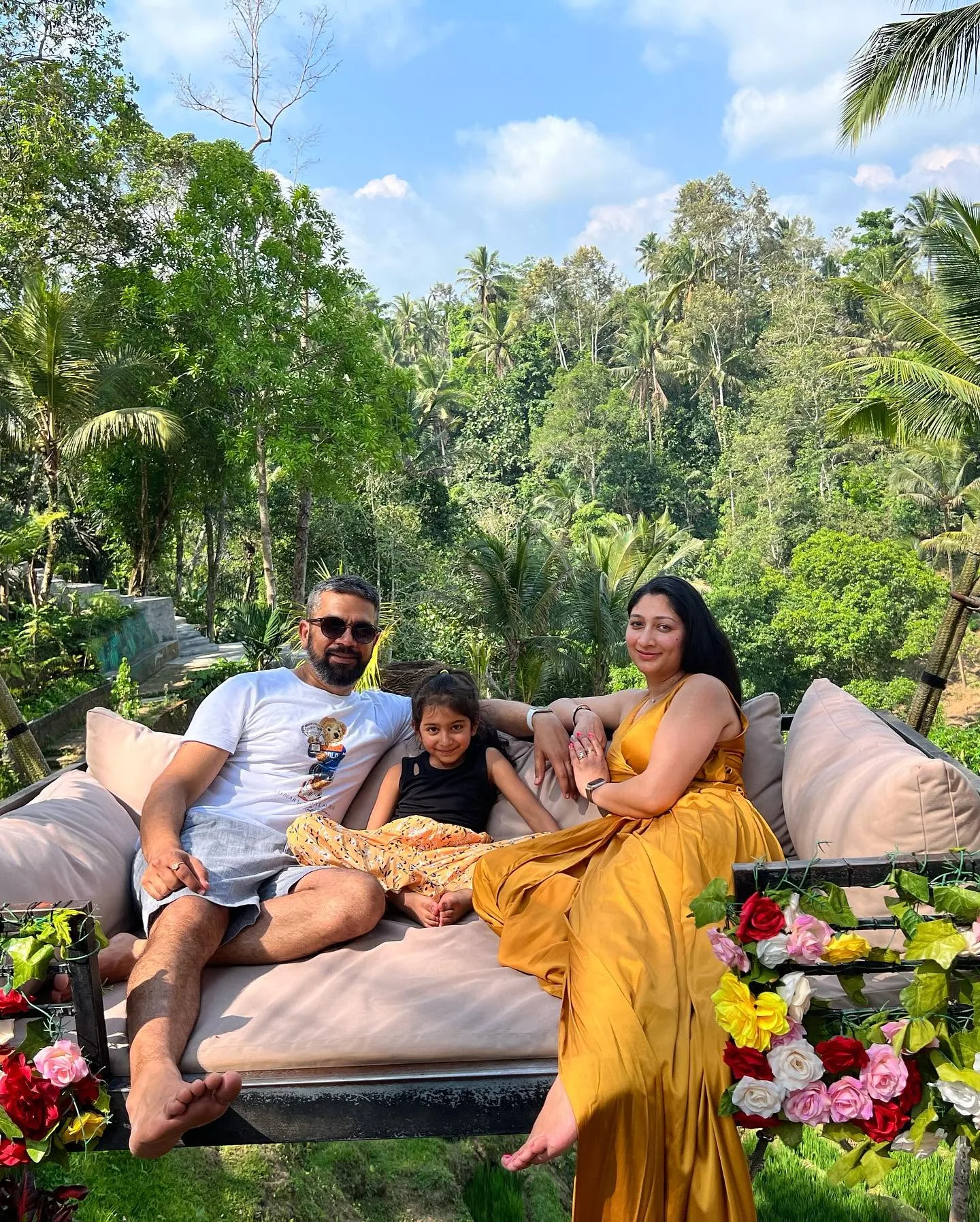 Family enjoying a scenic viewpoint in Ubud, Bali