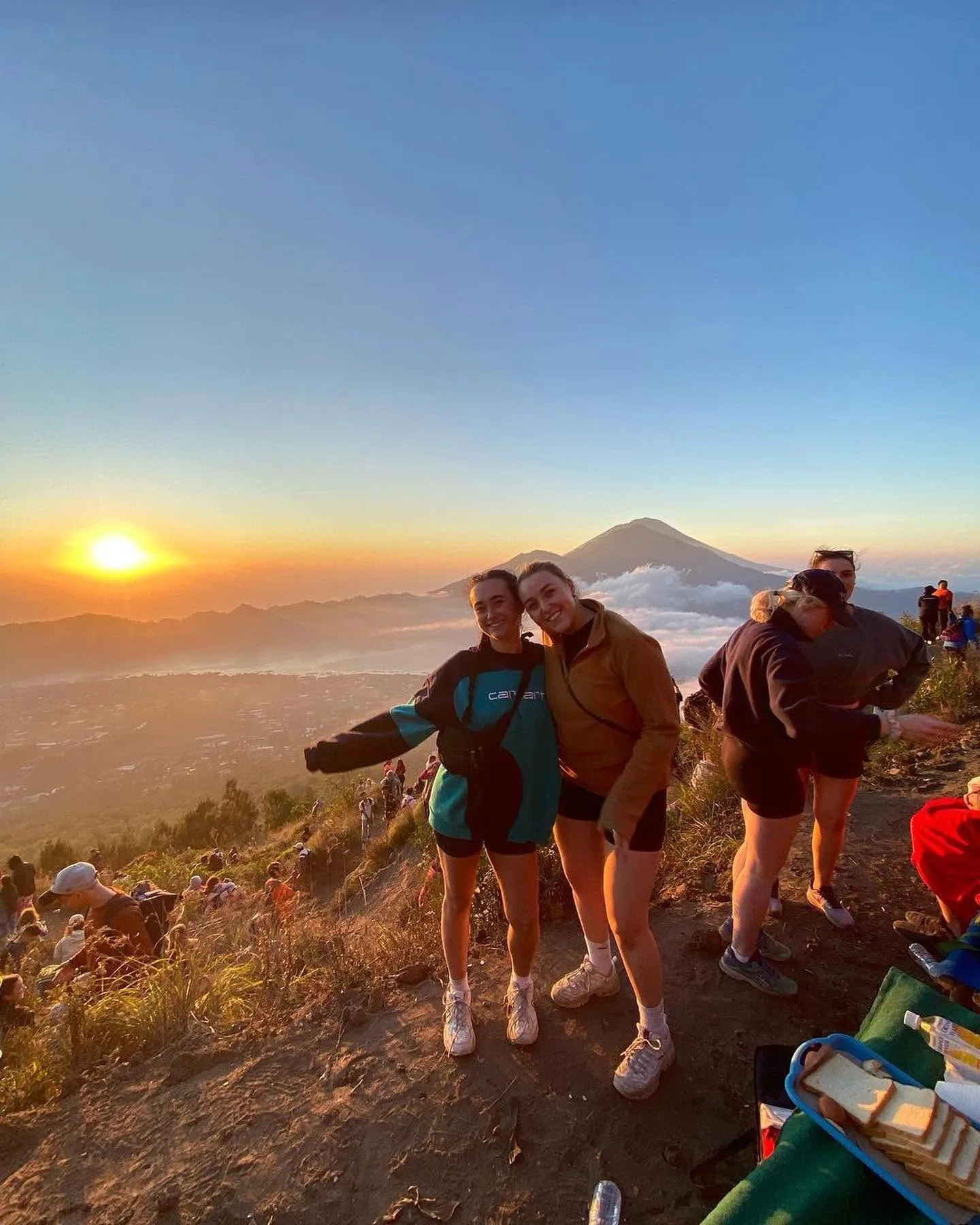 Guests watching the sunrise from Mount Batur
